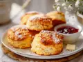 Nybakade scones med sylt och smör. Perfekt för fika, undrar vad man kan baka mer?